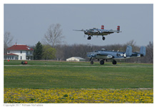 B-25J Mitchell 'Panchito' lands while PBJ-1J 'Semper Fi' taxiis at Grimes Field, Urbana, Ohio, on April 15, 2017