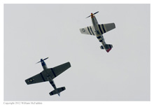 P-51D Mustangs 'Petie 2nd' & 'Gentleman Jim' at Grimes Field, Urbana, Ohio, on April 15, 2012